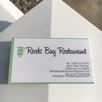 Reeds Bay Restaurant - a business card on a table - American Near Me - Galloway, New Jersey Reeds Bay Restaurant - a business card on a table - American Near Me - Galloway, New Jersey
