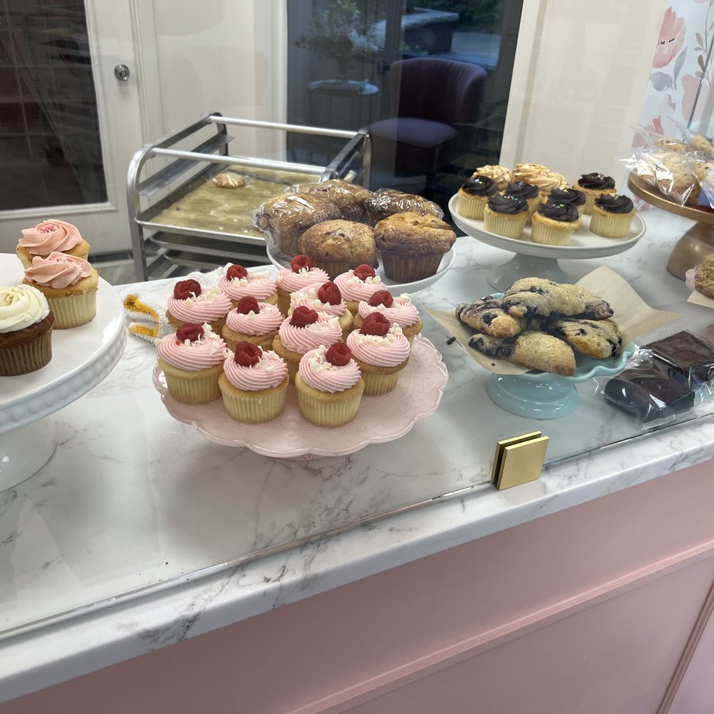 Indulgence Bakery - Selection of mini-cakes and cookies at indulgence. i'm told the blueberry scones (just to the right of the pink cup-cakes) are popular. - Bakeries Near Me - Saratoga Springs, New York Indulgence Bakery - Selection of mini-cakes and cookies at indulgence. i'm told the blueberry scones (just to the right of the pink cup-cakes) are popular. - Bakeries Near Me - Saratoga Springs, New York