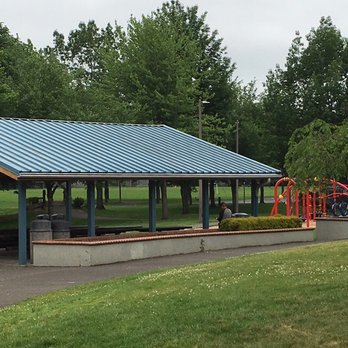 Red Sunset Park - Ramadas covering picnic tables located in between playground areas near the restrooms & parking lot. - Parks Near Me - Gresham, Oregon Red Sunset Park - Ramadas covering picnic tables located in between playground areas near the restrooms & parking lot. - Parks Near Me - Gresham, Oregon