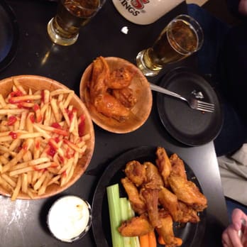 Duff's Famous Wings - No.3: 20 wings comes with a small pitcher of beer and fries! - American Near Me - Amherst, New York Duff's Famous Wings - No.3: 20 wings comes with a small pitcher of beer and fries! - American Near Me - Amherst, New York