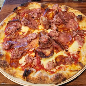 Bruschetta - Carnivor pizza (salami, fennel sausage, calabrian salami, sofrisota salami, tomato sauce, mozzarella) - Italian Near Me - Stateline, Nevada