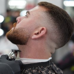Rich And Famous Barbershop - Haircut and beard line up!