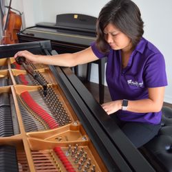 Michelle’s Melody Fine Piano Tuning - Herself, piano, tuning hammer