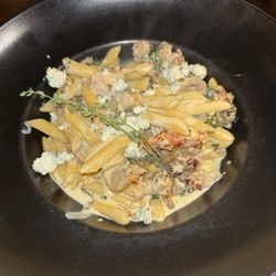 Papardelle Rusticana - sweet sausage, sun-dried tomatoes, porcini mushrooms, spinach, in a light parmigiana sauce