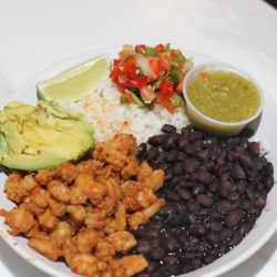 Shrimp Asado Bowl inspired by the coastal flavors of Mexico, this bowl brings together shrimp, black beans, topped with pico de gallo.
