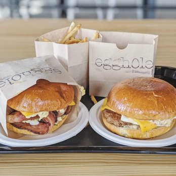 Egghole - A Walk of Shame (left) with a Sausage, Egg and Cheese (right), and shoestring fries. - Breakfast & Brunch Near Me - Kent, Washington Egghole - A Walk of Shame (left) with a Sausage, Egg and Cheese (right), and shoestring fries. - Breakfast & Brunch Near Me - Kent, Washington