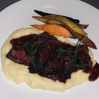 Price Tower Plaza - Wagyu steak with roasted carrots - Bars Near Me - Bartlesville, Oklahoma Price Tower Plaza - Wagyu steak with roasted carrots - Bars Near Me - Bartlesville, Oklahoma