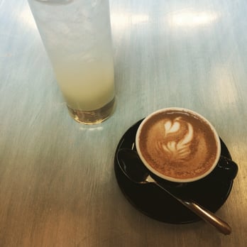 Little Oddfellows - Lemon Rosemary soda, a macchiato and a swan who lives in the macchiato. - Cafes Near Me - Seattle, Washington