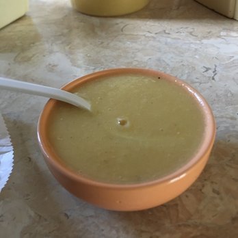 Pita Cafe - a bowl of soup with a spoon in it - Middle Eastern Near Me - Oak Park, Michigan Pita Cafe - a bowl of soup with a spoon in it - Middle Eastern Near Me - Oak Park, Michigan
