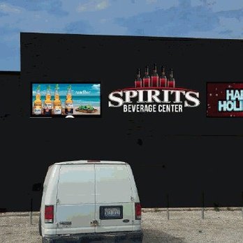 Spirits Beer & Wine - a man standing in front of a building - Beer, Wine & Spirits Near Me - Chicago, Illinois Spirits Beer & Wine - a man standing in front of a building - Beer, Wine & Spirits Near Me - Chicago, Illinois