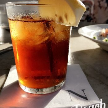 Nick's Manhattan Beach - Sea bass and a refreshing iced tea - American Near Me - Manhattan Beach, California Nick's Manhattan Beach - Sea bass and a refreshing iced tea - American Near Me - Manhattan Beach, California