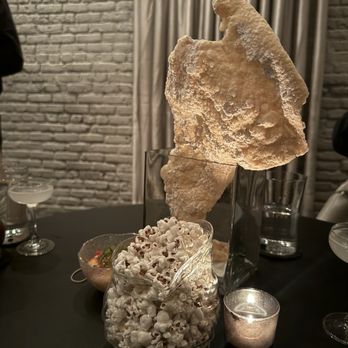 The Aviary - Truffle popcorn and cheddar puff - Cocktail Bars Near Me - Chicago, Illinois