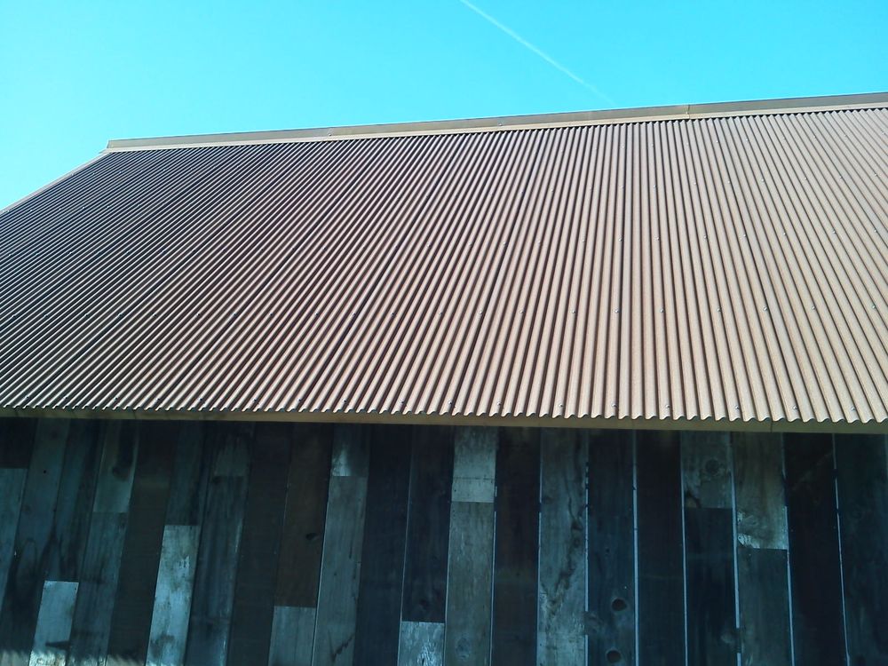 Slide of Wick's Roofing
