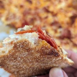 Hair baked into pizza crust