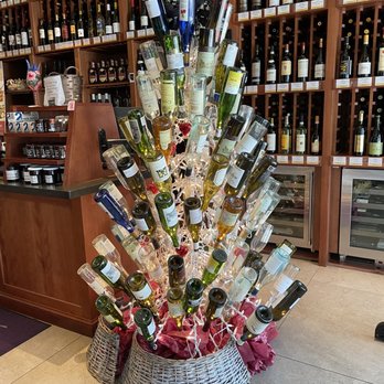 The Wine and Spirits Kitchen - Wine bottle tree - New American Near Me - Delray Beach, Florida The Wine and Spirits Kitchen - Wine bottle tree - New American Near Me - Delray Beach, Florida