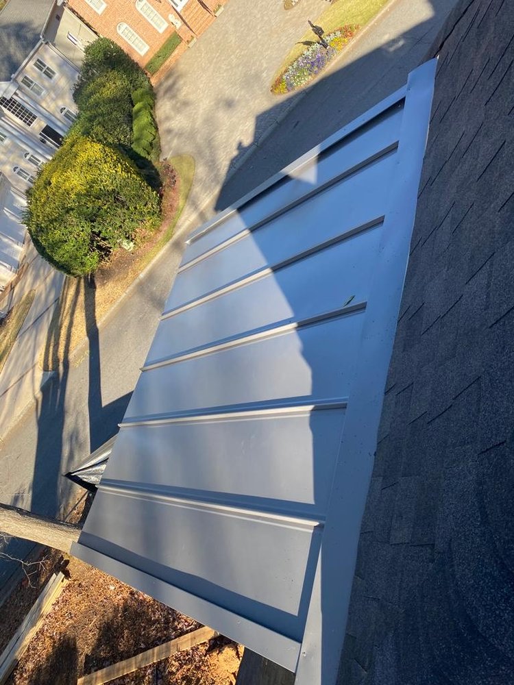 Slide of J Juarez Roofing