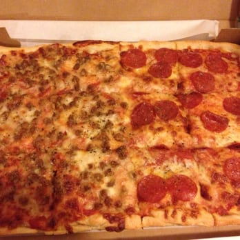 Donatello's Restaurant - Half Tray with sausage and pepperoni. - Pizza Near Me - Niagara Falls, New York Donatello's Restaurant - Half Tray with sausage and pepperoni. - Pizza Near Me - Niagara Falls, New York