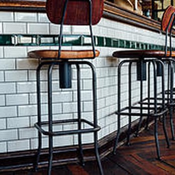 iDevelop Construction - a row of bar stools - General Contractors Near Me iDevelop Construction - a row of bar stools - General Contractors Near Me