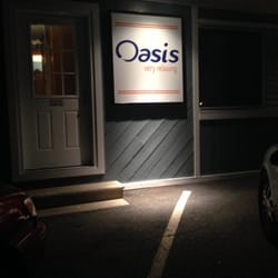 Oasis Hot Tubs - New Sign! I don't see a bullet hole.