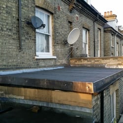 M W Bates Roofing & Building Ltd - New flat roof with lead drips secured with lead domes.
M.W.BATES Roofing & Building Ltd