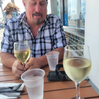 Hook & Anchor - Sitting outside enjoying a glass of wine waiting for lobster taco's. - Seafood Near Me - Costa Mesa, California