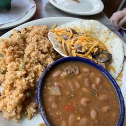 Fajita tacos with rice and charro beans. Fajita tacos with rice and charro beans.