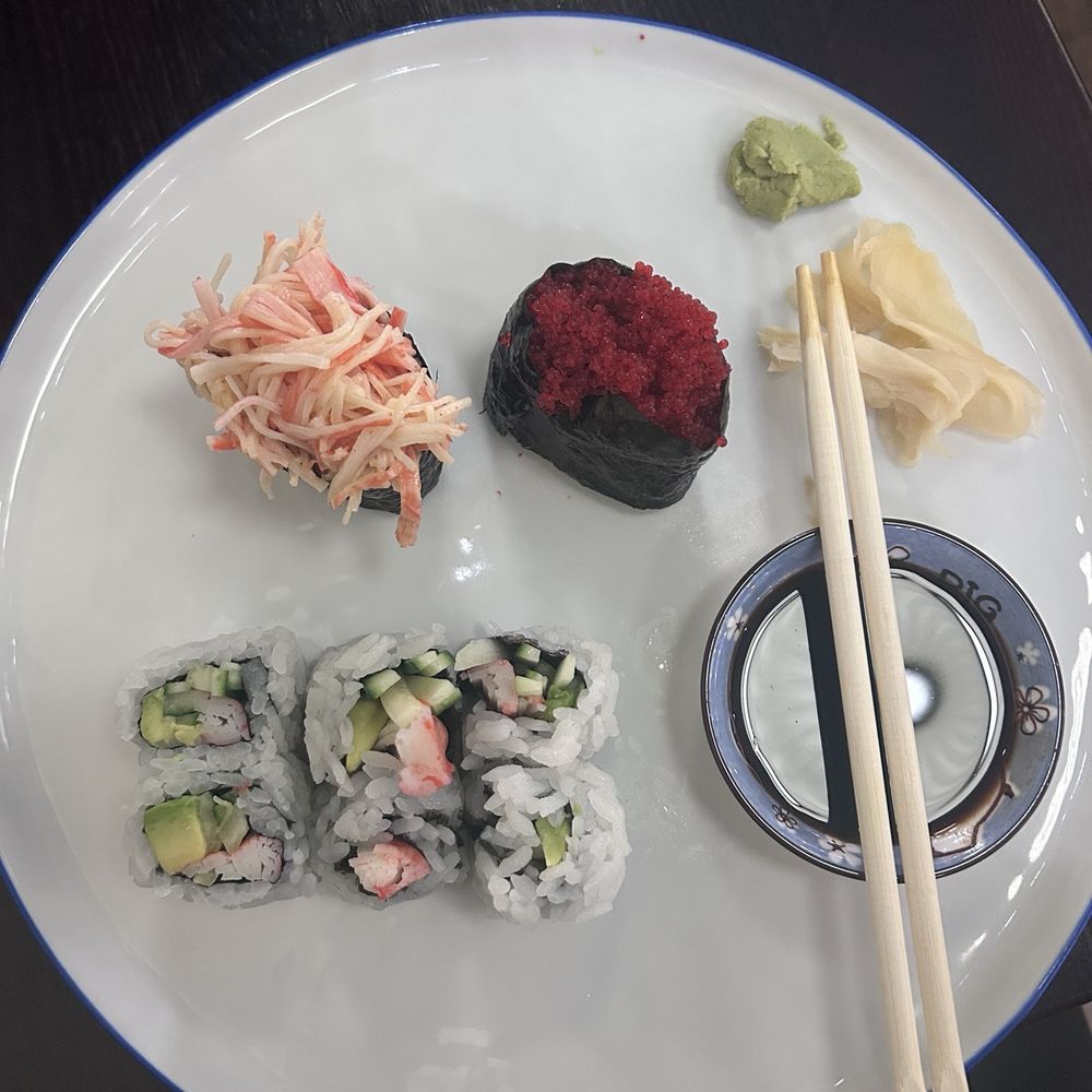 Spicy crab roll, tobiko roll, and California Roll Spicy crab roll, tobiko roll, and California Roll