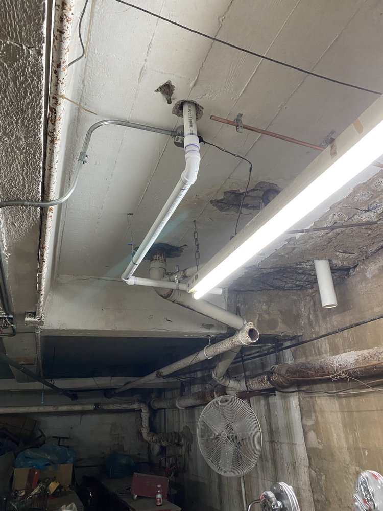 Slide of The in and out plumbing guy