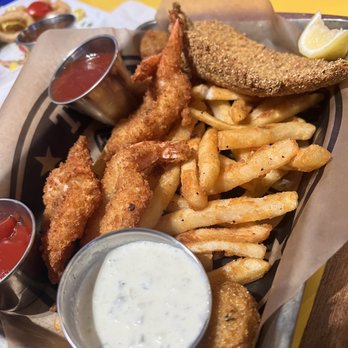 The Boat - Catfish, shrimp, fries, hush puppies combo basket - Seafood Near Me - Austin, Texas The Boat - Catfish, shrimp, fries, hush puppies combo basket - Seafood Near Me - Austin, Texas