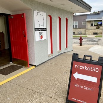 Market30 - a red and white sign in front of a store - Grocery Near Me - Cudahy, Wisconsin Market30 - a red and white sign in front of a store - Grocery Near Me - Cudahy, Wisconsin