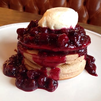 Swan - Buttermilk pancakes, berry compote and vanilla cream. - British Near Me - Bankside, XGL Swan - Buttermilk pancakes, berry compote and vanilla cream. - British Near Me - Bankside, XGL