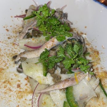 Nancy's Hustle - shaved kohlrabi with boquerones, capers, red onions, jalapenos and buttermilk dressing ....14 - New American Near Me - Houston, Texas Nancy's Hustle - shaved kohlrabi with boquerones, capers, red onions, jalapenos and buttermilk dressing ....14 - New American Near Me - Houston, Texas