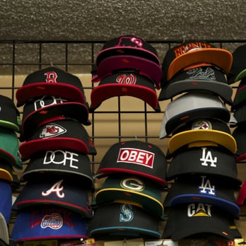 Sandy's Liquor - a rack of hats for sale - Beer, Wine & Spirits Near Me - Carson, California Sandy's Liquor - a rack of hats for sale - Beer, Wine & Spirits Near Me - Carson, California