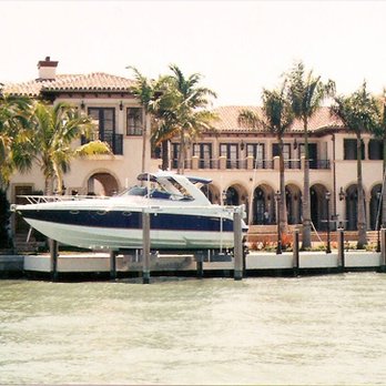 Southern Marine Construction - a boat docked at a dock - General Contractors Near Me - Miami, Florida Southern Marine Construction - a boat docked at a dock - General Contractors Near Me - Miami, Florida