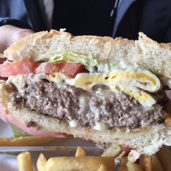 Nazareth Bread - 8 ounce burger with a fried egg. - Mediterranean Near Me - Greensboro, North Carolina
