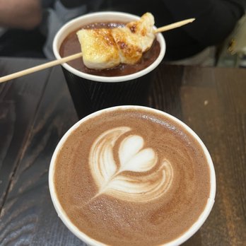 Amara Chocolate & Coffee - Cacao Latte (front), Raymond Latte (back) - Coffee & Tea Near Me - Pasadena, California Amara Chocolate & Coffee - Cacao Latte (front), Raymond Latte (back) - Coffee & Tea Near Me - Pasadena, California