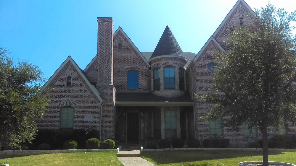 Slide of Reveles Roofing