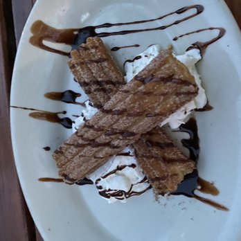 Hood River Taqueria - Churros. Served warm but Doughy, heavy, drizzled w Hershey's syrup. - Mexican Near Me - Hood River, Oregon Hood River Taqueria - Churros. Served warm but Doughy, heavy, drizzled w Hershey's syrup. - Mexican Near Me - Hood River, Oregon