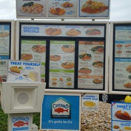 a menu board and a parking meter