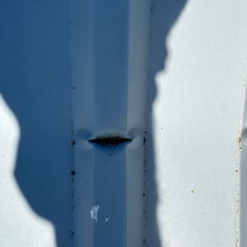 A-1 Siding & Windows - Huge hole from bending metal by installers - Windows Installation Near Me - Seminole, Texas A-1 Siding & Windows - Huge hole from bending metal by installers - Windows Installation Near Me - Seminole, Texas