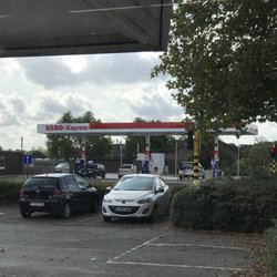 Esso - Esso Express has been renovated for the safety of the cyclist and pedestrians. Now there's one way in and another way out.