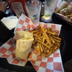 1/2 Caesar salad wrap and 1/2 buffalo chicken wrap