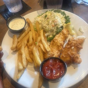 Tug's Casual Dining - Cod, battered fish, french fries and coleslaw - New American Near Me - Memphis, Tennessee Tug's Casual Dining - Cod, battered fish, french fries and coleslaw - New American Near Me - Memphis, Tennessee