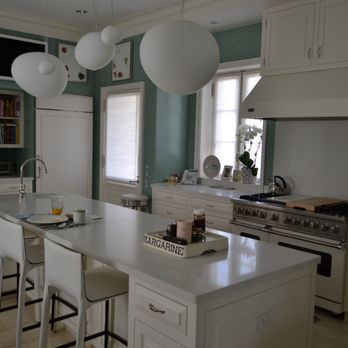 Natural Stone Designs - a kitchen with a large island - General Contractors Near Me - Carrollton, Texas Natural Stone Designs - a kitchen with a large island - General Contractors Near Me - Carrollton, Texas