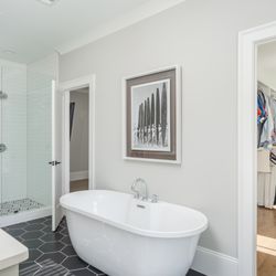 Drexler Glass - Frameless Door and Fixed Panel Shower