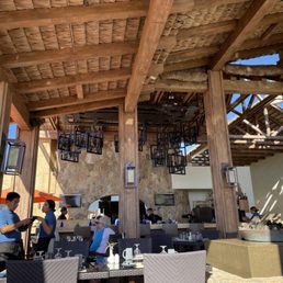 Open air dining room and bar. Open air dining room and bar.