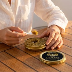 Serving Kolikof Ossetra caviar with a pearl spoon. Ossetra caviar, caviar service, caviar tasting, fresh caviar, entertaining.