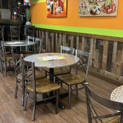 El Kiosko Tomball - Some of the seating available! Music playing and cartoon on the tv when we were there.