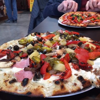 1000 Degrees Pizza - Cleveland, TN - My eclectic pizza. 10 inch, but half of it was very filling, so so got a to-go box. - Pizza Near Me - Cleveland, Tennessee 1000 Degrees Pizza - Cleveland, TN - My eclectic pizza. 10 inch, but half of it was very filling, so so got a to-go box. - Pizza Near Me - Cleveland, Tennessee