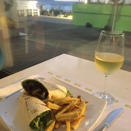 Vegan wrap with fries and house wine Vegan wrap with fries and house wine